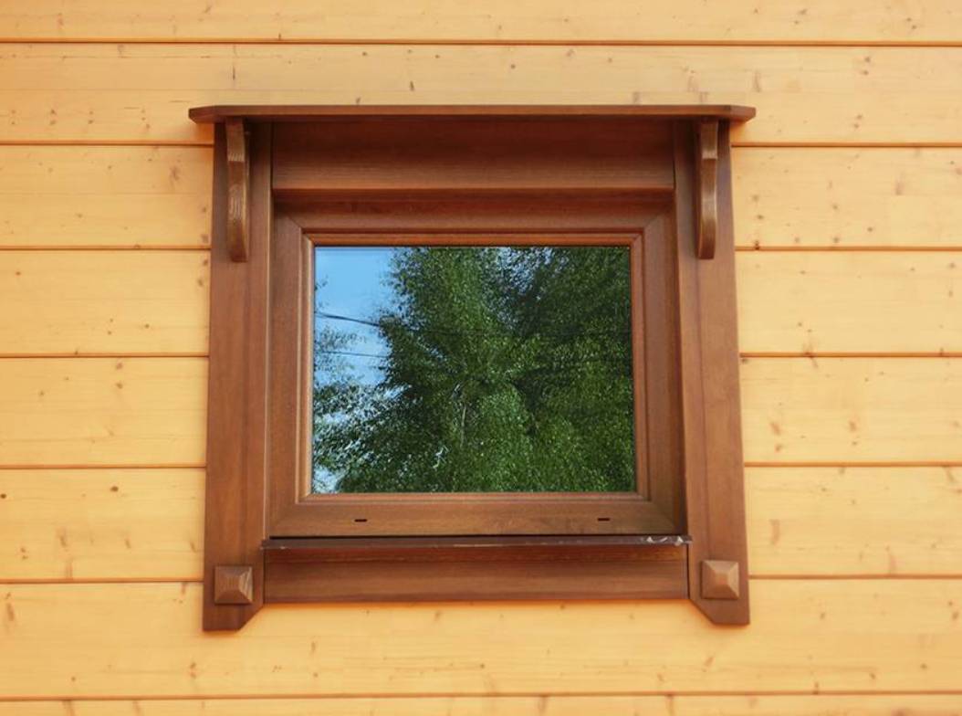 Обналичка окна в деревянном доме